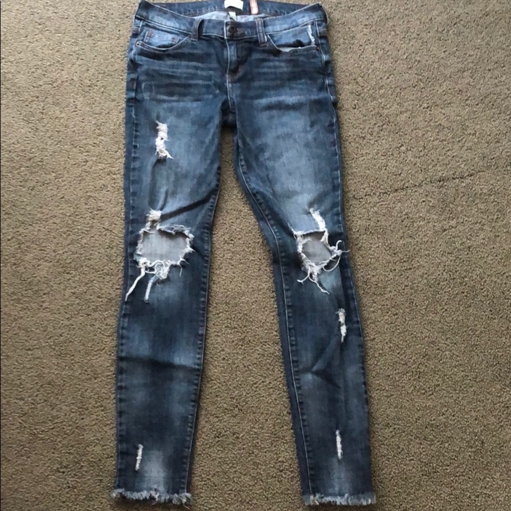 Distressed denim jeans